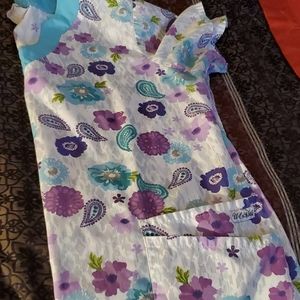 3 scrub tops and 1 pair of pants